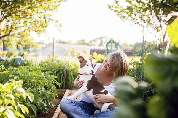 © Jessica Cobb Pet Photography | Lifestyle-dog-photography, girl and her dog, woman and dog in vegetable garden