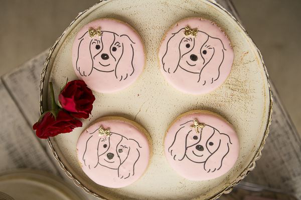 delightful pink cookies with Cavalier design and gold bow