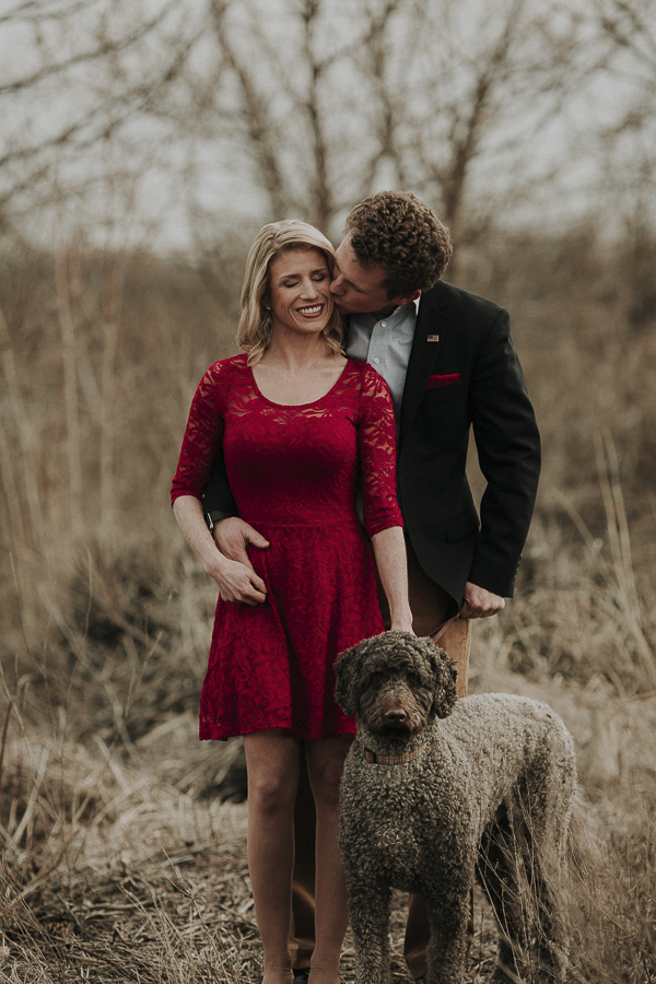 Labradoodle, winter engagement photos, woman in red dress, dog