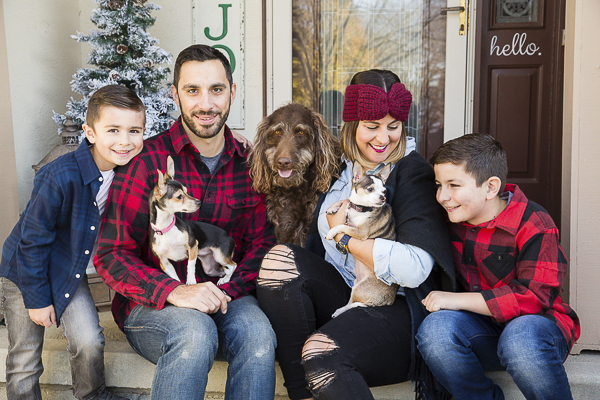 lifestyle family photos with dogs, making a difference by fostering pets