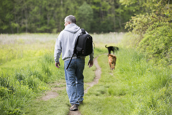 man hiking with dogs, lifestyle dog photographer