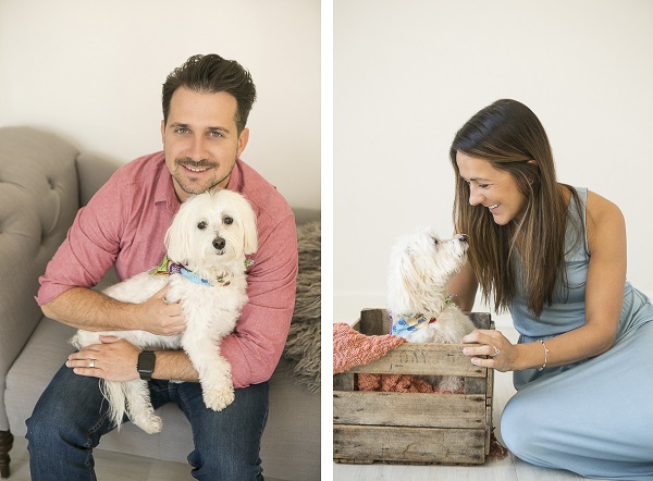 man's best friend, love between human and dog, man holding small white dog, woman looking at Havanese mix