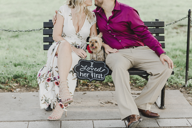 couple sitting on bench with dog , ©M Harris Studios | DC Engagement photos with Yorkie