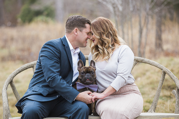 cute dog sitting between favorite people, engagement photos with dogs ©Meghan Rolfe Photography | Asheville, NC Engagement photos