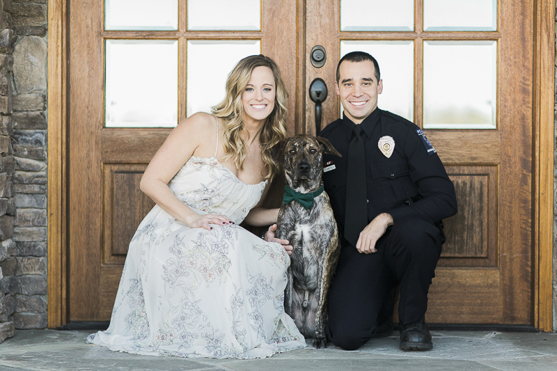 woman, dog, police officer in front of venue doors, ©Sidney Leigh Photography | Monroe, NC, engagement pictures with a dog