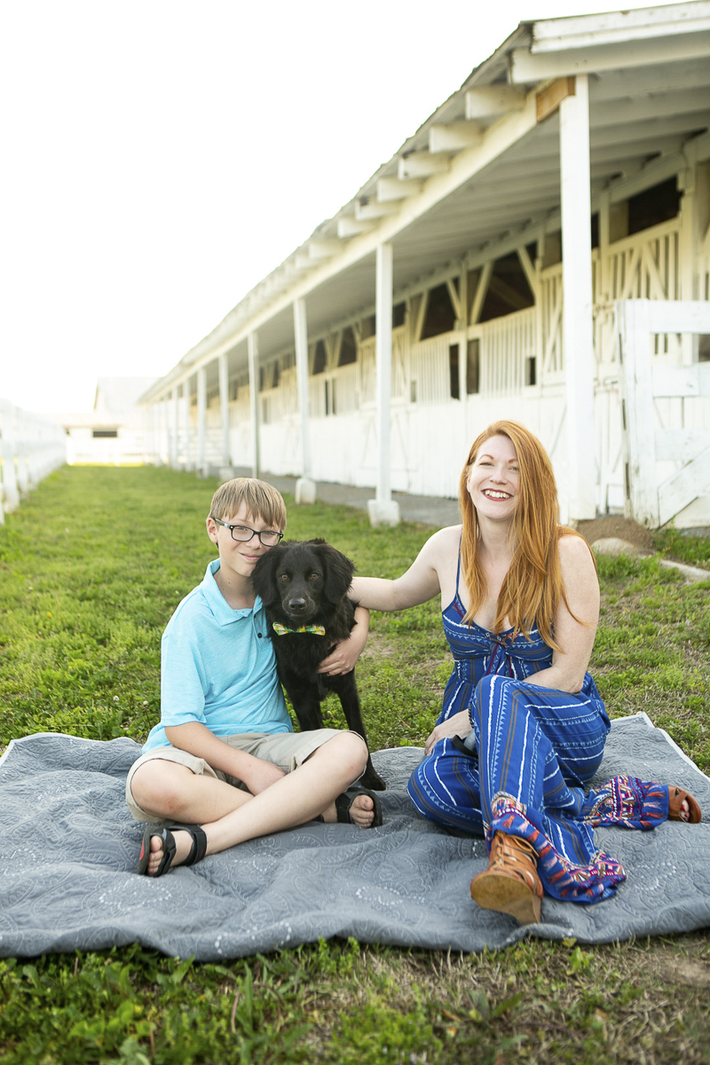 dog leaning on boy, family portraits at horse farm, ©Mandy Whitley Photography | Nashville puppy portraits