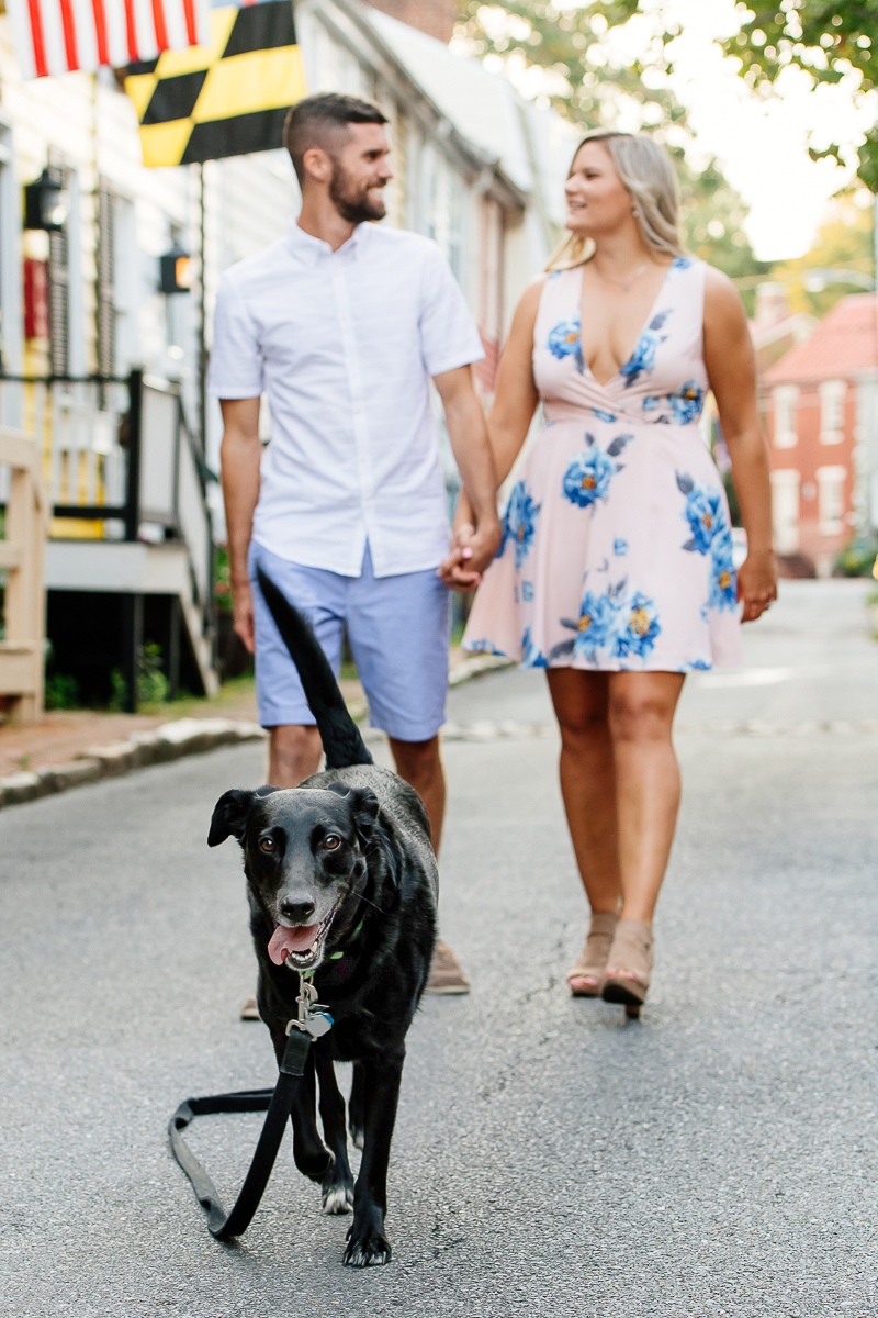 couple walking their dog while holding hands, ©Rachel Smith Photography