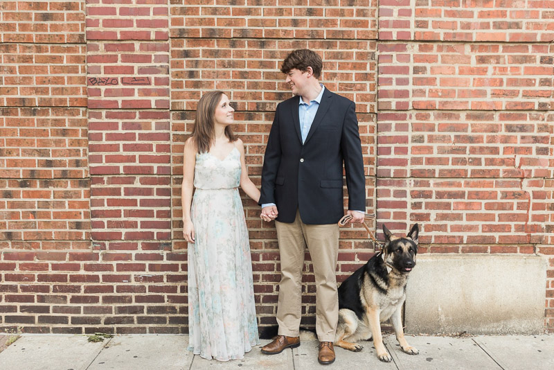 couple wearing dressy outfit with their dog, engagement photos with dog, ©Story & Rhythm, Raleigh, NC engagement session