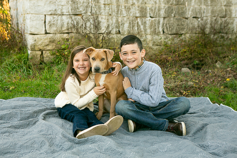 kids and their puppy, dog-friendly family photo ideas, ©Mandy Whitley Photography | Nashville Pet Photography