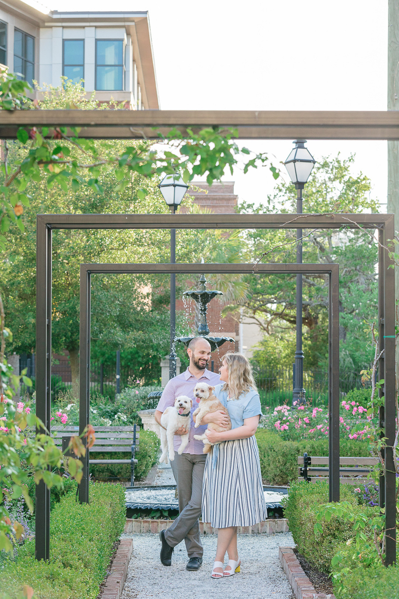 couple and their dogs in Charleston park | ©Charleston Photo Art, dog-friendly family portraits 